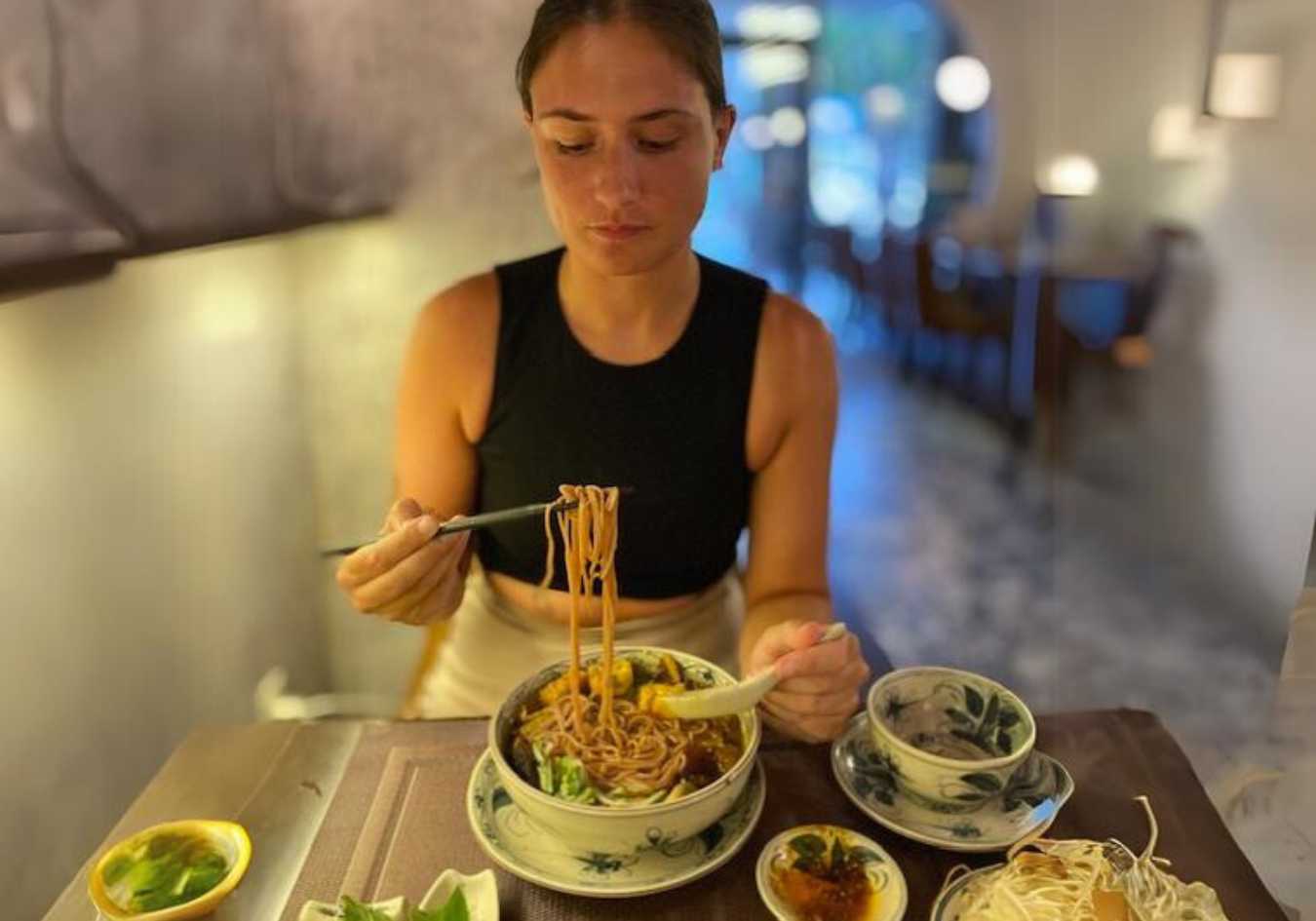 Lucy eating vegan food in the most vegan friendly city in Vietnam, HCMC